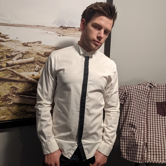 A button up Hugo Boss dress shirt with a back stripe down the middles - Picture 2 of 2